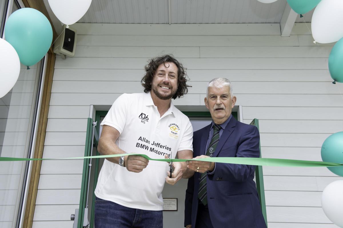 Picture by Allan McKenzie/SWpix.com - 22/05/2022 - Cricket - Olicanian Cricket Clubhouse Opening - Olicanian Cricket Cricket Ground, Ilkley, England - Ryan Sidebottom cuts the ribbon with club President Mick Christopher to officially open the new