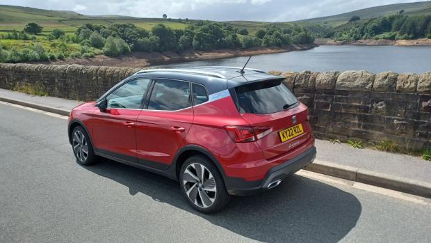 Ilkley Gazette: The SEAT Arona on test in West Yorkshire, pictured next to Digley Reservoir in Kirklees (left) and near Castle Hill, Huddersfield (top left)