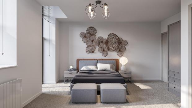 Ilkley Gazette: A bedroom inside an apartment