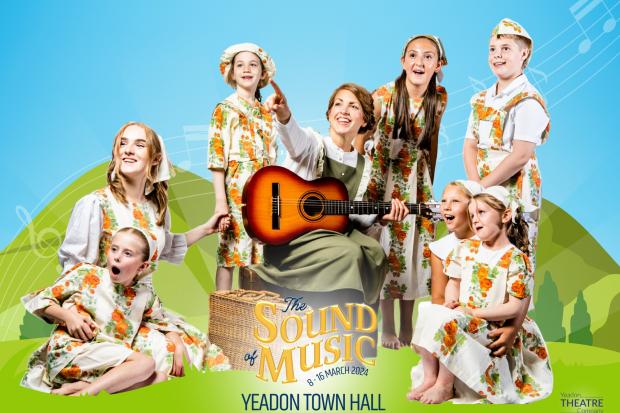 Lucy Boniface as Maria with one team of Von Trapp children