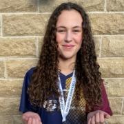Alex Dunn (Guiseley) claimed silver in the girls fifteen years 50m breaststroke