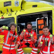 Members of the Yorkshire Air Ambulance team with tennis balls after being named as the charity of the Ilkley Trophy