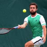 Charles Broom defeated Gilles Simon (centre) in Sunday's qualifying at the Ilkley Trophy. Picture: Mike Swift.