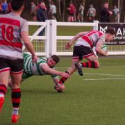 Action from Ilkley's (grey and red shirts) defeat at Billingham last Saturday