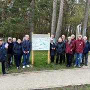 Lower Wharfedale Ramblers and Washburn Heritage Centre members with the new footpath map at Swinsty Reservoir in the Washburn Valley