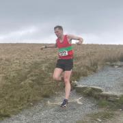Ruaridh Mon-Williams, first Harrier home at the Three Peaks fell race. Photo credit: Jonathan Turner