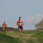 Tom Adams and Nathan Edmondson battling it out for first place at the Pete Shields Ilkley Trail race. Photo credit: Peter Shelley