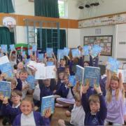 Pupils at Newlaithes Primary School, Horsforth with their dictionaries