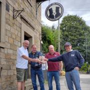 L-R: Eddie Conneely, of Otley Pub Club, buyers Kevin Daphne and Philip Lister, and Bob Brook, of Otley Pub Club