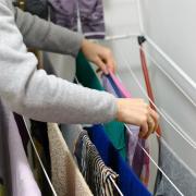 From the burrito method to a little bit of DIY, here are some ways to dry clothes indoors if you live in a smaller home.