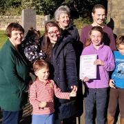 Members of St John's Church, Menston with the certificate confirming the  Eco Church Silver award
