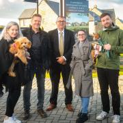 First residents the Wilkinsons and the Pages pictured with David Wilson Homes MD Gavin Birch at Centurion Meadows in Burley-in-Wharfedale