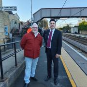 Councillor Bob Felstead and Transport Minister Huw Merriman at Menston Railway Station