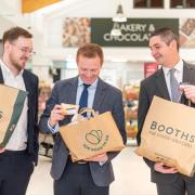 Too Good to Go founder Jamie Crummie meeting MP Robbie Moore and Booths MD Nigel Murray at Booths Ilkley