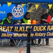 Ilkley Rotarians John Hall, David Sleightholme, Marilyn Ginns and Chris Jones selling Duck Race tickets at The Easter Saturday Market on The Grove