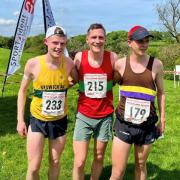 Ben Rothery (middle) with the 2nd and 3rd placed runners after Pendle Cloughs